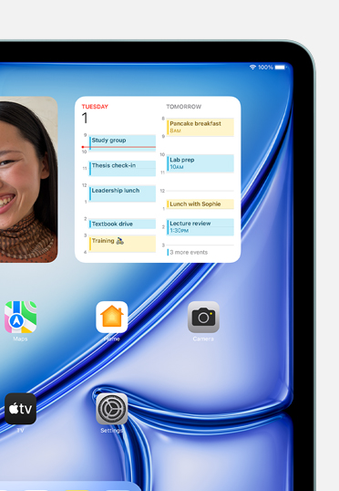 Multiple widgets and apps displayed on a screen, including Photos, Calendar, Maps, Home, Camera, TV, News, and Settings.
