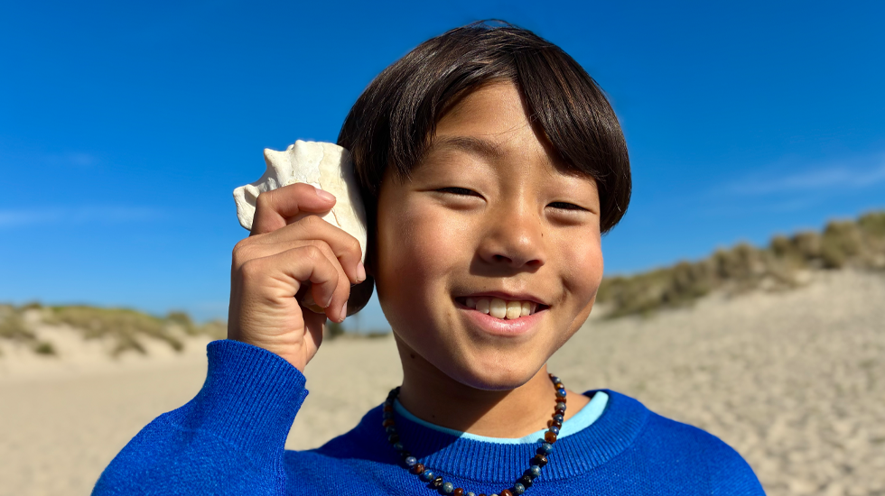 Photo taken with 48MP Fusion camera, next-generation portraits feature in use, focused on a person's face