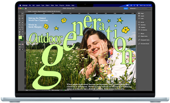 A MacBook Air displaying an Adobe InDesign project