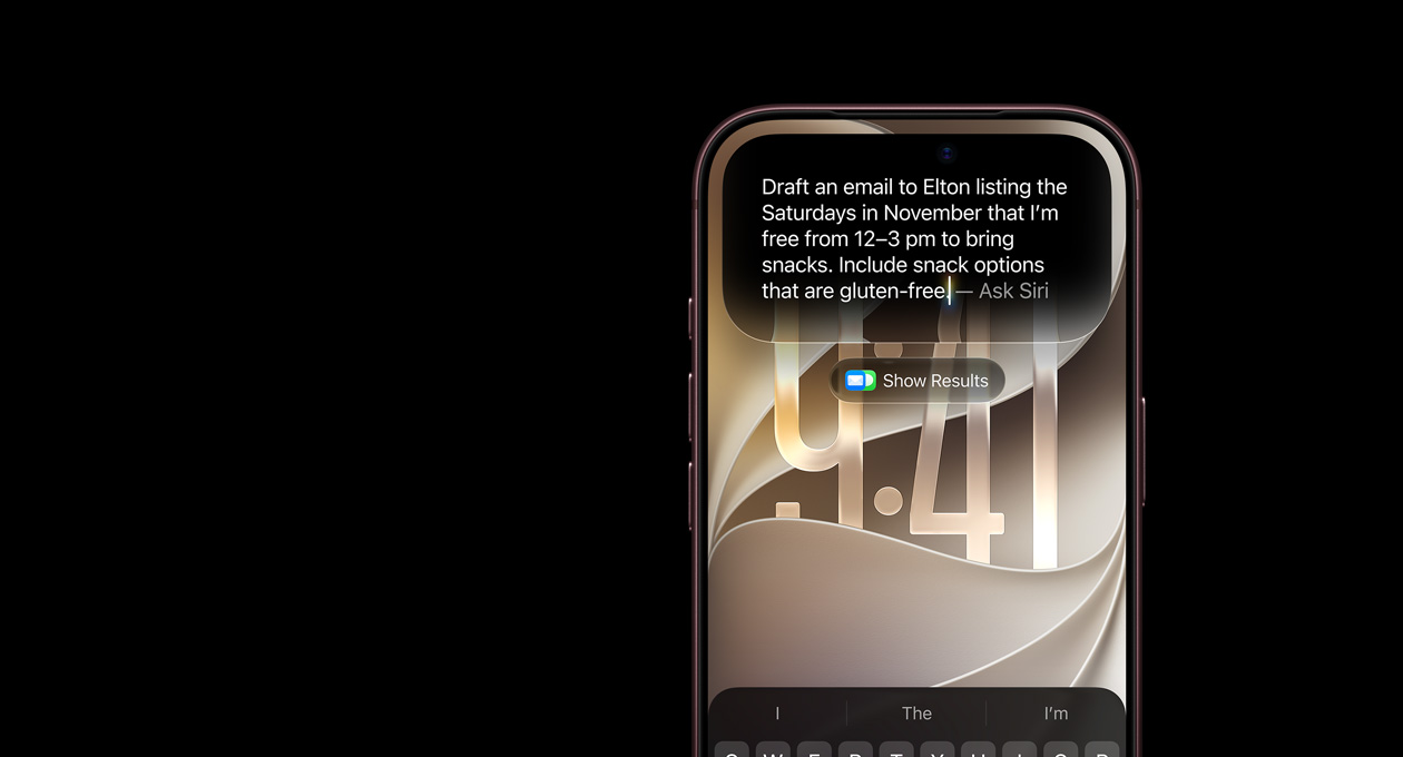 iPhone 18 Pro, Burgundy, screen displaying an Ask Siri prompt reading, draft an email to Elton listing the Saturdays in November that I’m free from 12 pm to 3 pm to bring snacks. Include snack options that are gluten-free