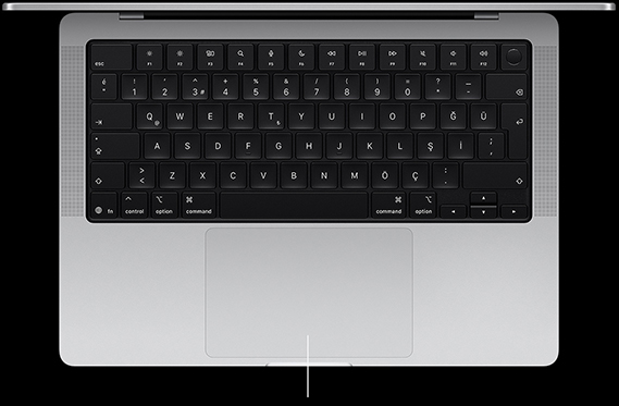 Klavyenin altında bulunan Force Touch trackpad’i gösteren açık haldeki bir 14 inç MacBook Pro’nun üstten görünümü
