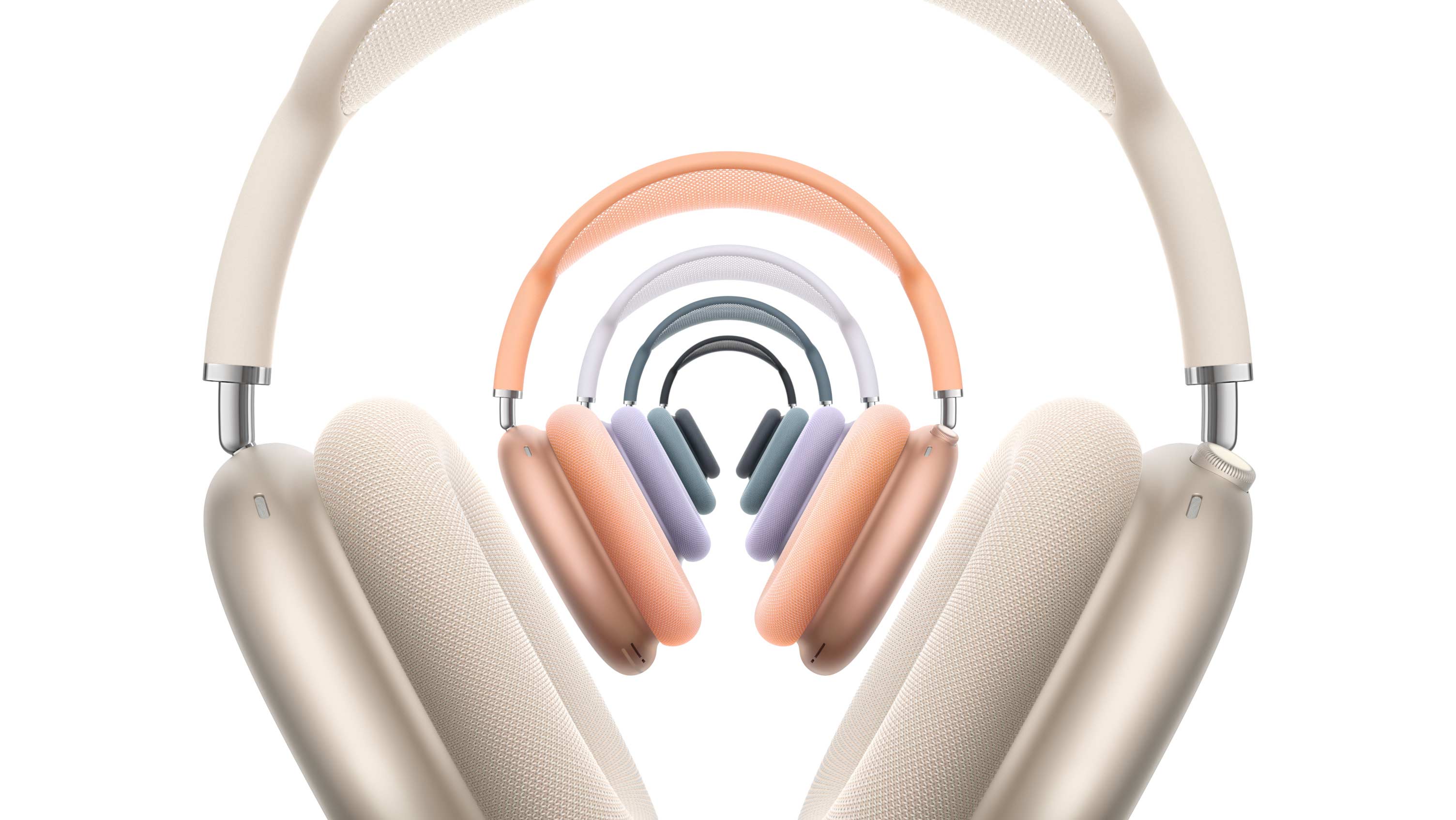 Πέντε ζευγάρια ακουστικών AirPods Max 2, μπροστινή εξωτερική όψη, στοιβαγμένα, σε χρώματα λευκό της αστροφεγγιάς, πορτοκαλί, μωβ, μπλε και μαύρο του μεσονυκτίου