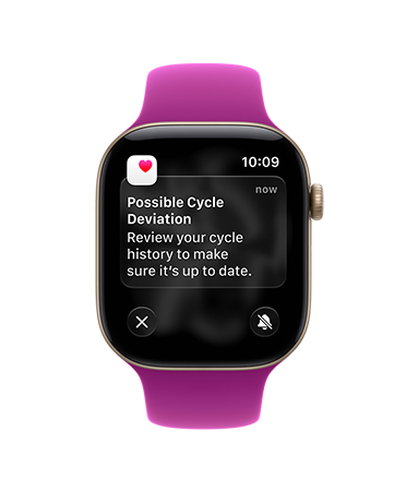 Apple Watch Series 12 z kopertą z aluminium w kolorze jasnego złota, pasek sportowy w kolorze magenty, powiadomienie o możliwym zaburzeniu cyklu