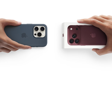 Zwei Hände tauschen ein in Zahlung gegebenes iPhone 13 mit Silikon Case und Aufklebern auf der Rückseite gegen ein neues iPhone 18 Pro im Karton.