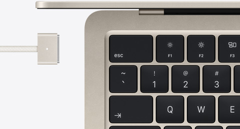 MacBook Air in Starlight color with color-matched MagSafe cable