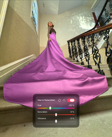 Photo of woman in elaborate pink dress ascending staircase in fancy house with hue and saturation window open