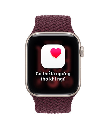 Apple Watch SE 3, vỏ nhôm, màu ánh sao, thông báo nghi bị ngưng thở khi ngủ, biểu tượng trái tim màu hồng trong khung trắng, mặt ngoài bên phải, Digital Crown, Dây Đeo Thể Thao, màu tím sương khói